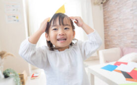 Girl playing cheerfully in the room