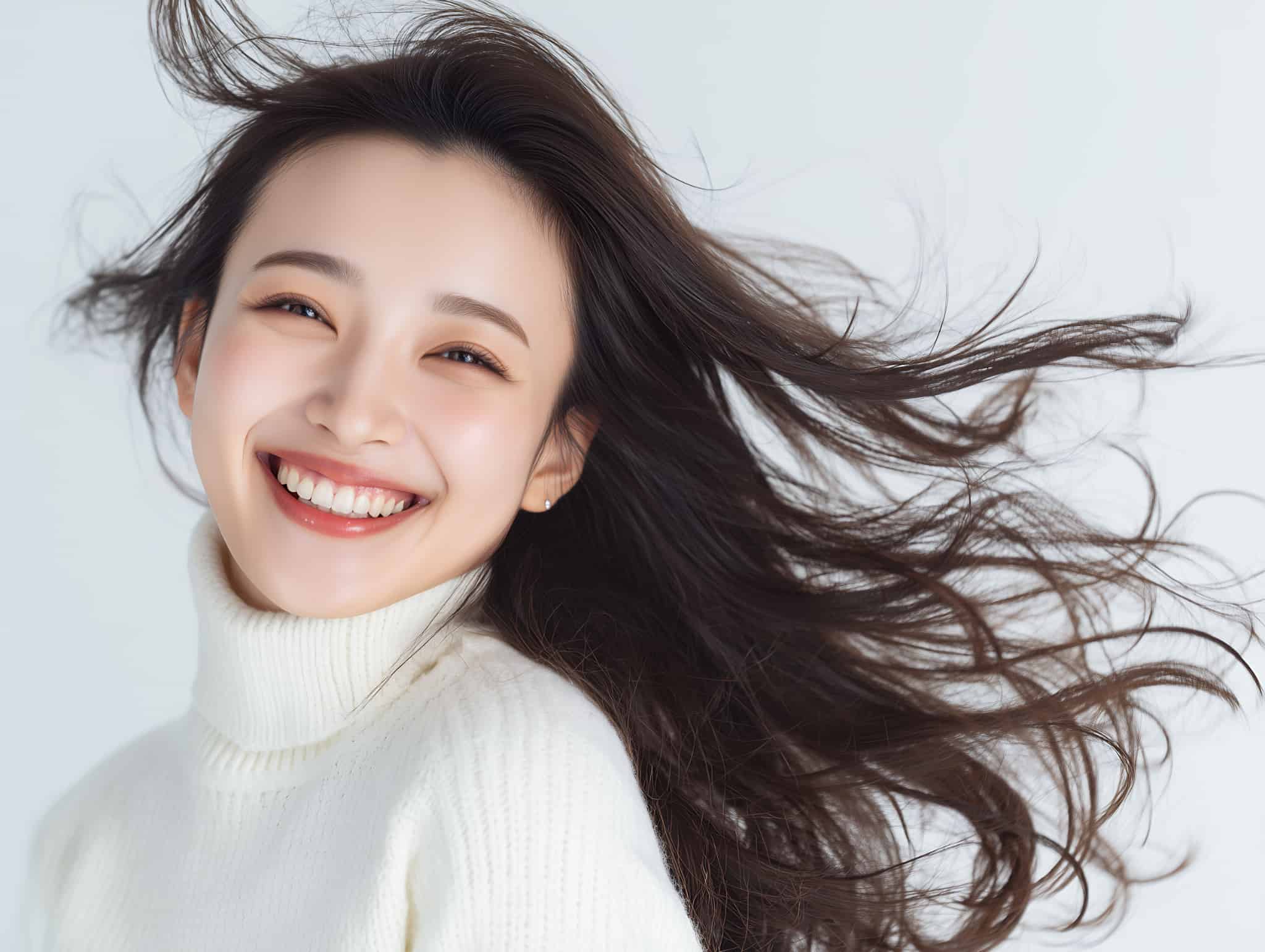 インビザラインで美しい歯並びになった笑顔の女性